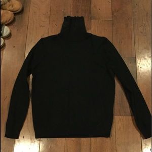 Junior’s turtle neck.